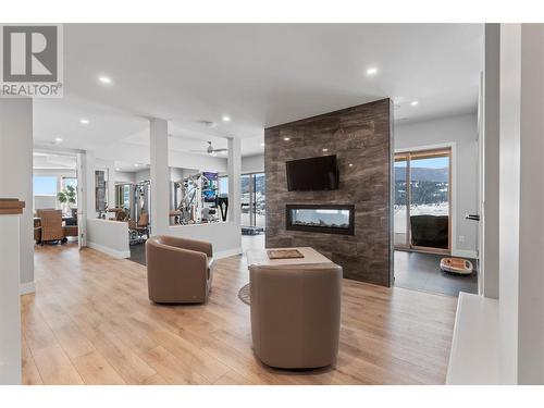 608 Mt Ida Crescent, Coldstream, BC - Indoor Photo Showing Living Room With Fireplace