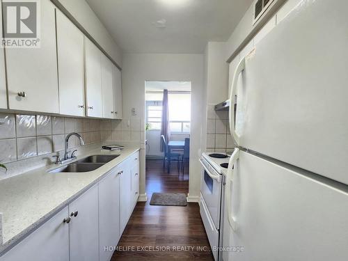 1207 - 3311 Kingston Road, Toronto (Scarborough Village), ON - Indoor Photo Showing Kitchen With Double Sink