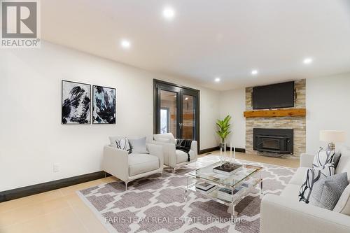 8 Campfire Court, Barrie (Codrington), ON - Indoor Photo Showing Living Room With Fireplace