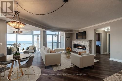 903 - 1477 Lakeshore Road, Burlington, ON - Indoor Photo Showing Living Room With Fireplace