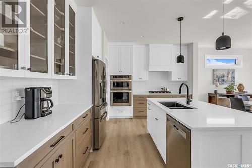 246 Prasad Manor, Saskatoon, SK - Indoor Photo Showing Kitchen With Stainless Steel Kitchen With Double Sink With Upgraded Kitchen