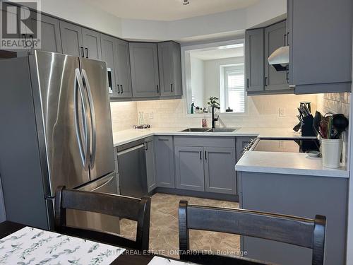 61 - 2145 North Routledge Park, London, ON - Indoor Photo Showing Kitchen With Stainless Steel Kitchen With Double Sink With Upgraded Kitchen