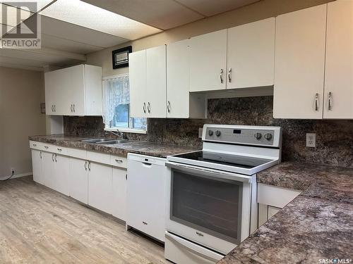 932 9Th Avenue Sw, Moose Jaw, SK - Indoor Photo Showing Kitchen With Double Sink