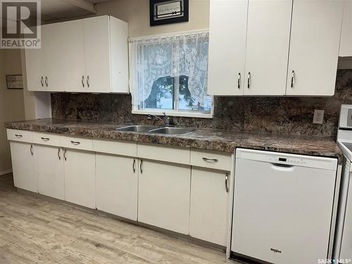 932 9Th Avenue Sw, Moose Jaw, SK - Indoor Photo Showing Kitchen With Double Sink