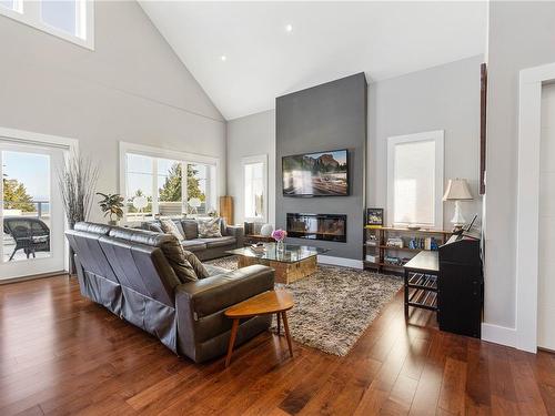 104-231 2Nd Ave, Qualicum Beach, BC - Indoor Photo Showing Living Room With Fireplace