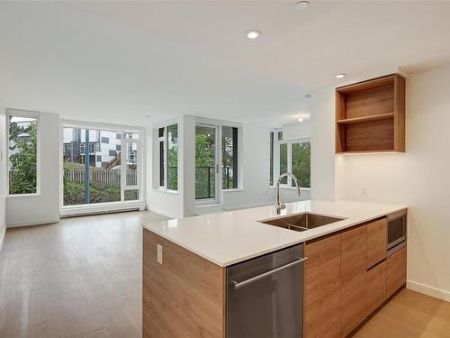 208-369 Tyee Rd, Victoria, BC - Indoor Photo Showing Kitchen With Double Sink