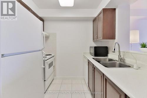 525 - 1883 Mcnicoll Avenue, Toronto (Steeles), ON - Indoor Photo Showing Kitchen With Double Sink