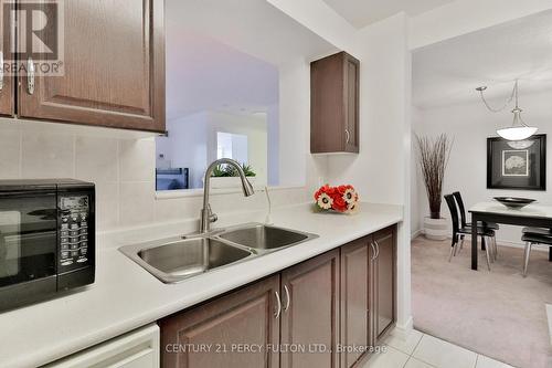 525 - 1883 Mcnicoll Avenue, Toronto (Steeles), ON - Indoor Photo Showing Kitchen With Double Sink