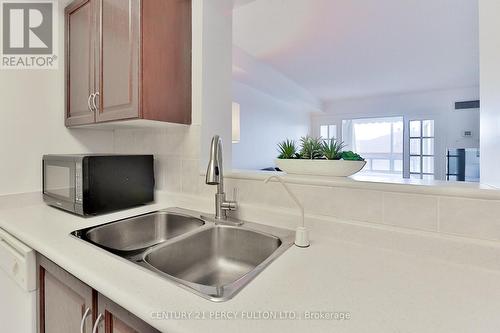 525 - 1883 Mcnicoll Avenue, Toronto (Steeles), ON - Indoor Photo Showing Kitchen With Double Sink