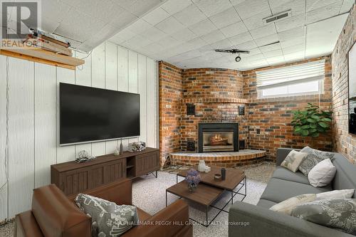 34 Strabane Avenue, Barrie (Codrington), ON - Indoor Photo Showing Living Room With Fireplace