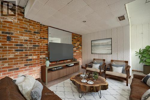 34 Strabane Avenue, Barrie, ON - Indoor Photo Showing Living Room With Fireplace