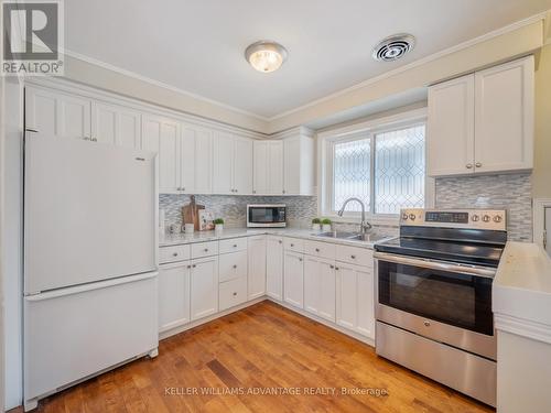 88 Wellesworth Drive, Toronto (Eringate-Centennial-West Deane), ON - Indoor Photo Showing Kitchen With Double Sink