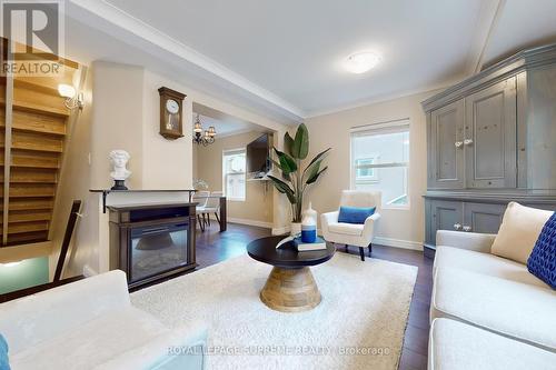 17 The Wishbone, Toronto, ON - Indoor Photo Showing Living Room With Fireplace