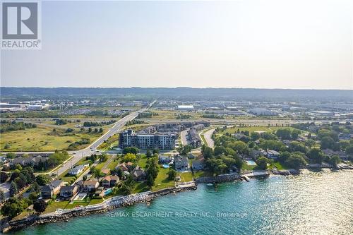 321 - 600 North Service Road, Hamilton (Lakeshore), ON - Outdoor With Body Of Water With View