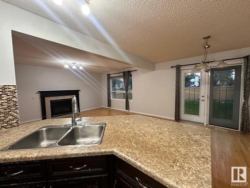 1569 37A Av Nw, Edmonton, AB - Indoor Photo Showing Kitchen With Double Sink