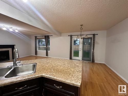 1569 37A Av Nw, Edmonton, AB - Indoor Photo Showing Kitchen With Double Sink