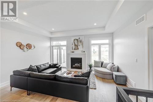 269 Pittock Park Road Unit# 12, Woodstock, ON - Indoor Photo Showing Living Room With Fireplace