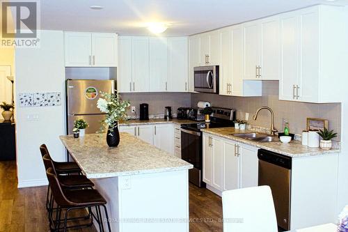 70 - 77 Diana Avenue, Brantford, ON - Indoor Photo Showing Kitchen With Double Sink