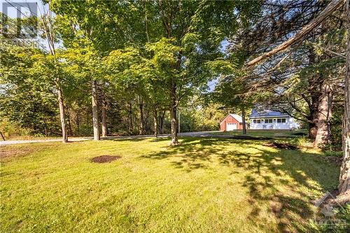 Front view with beautiful Mature Trees - 2713 Donnelly Drive, Ottawa, ON - Outdoor