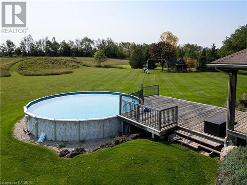 023038 Holland-Sydenham Townline, Chatsworth, ON - Outdoor With Above Ground Pool With Backyard