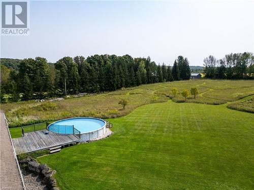 023038 Holland-Sydenham Townline, Chatsworth, ON - Outdoor With Above Ground Pool