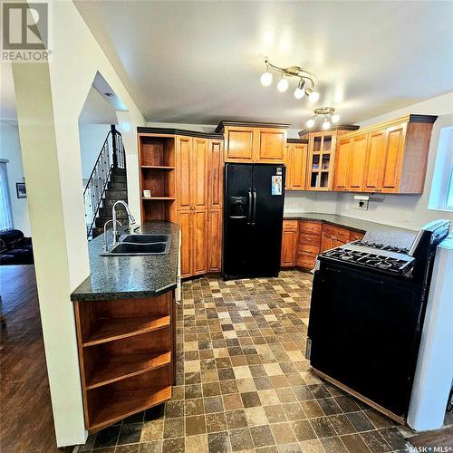 33 Railway Avenue, Yarbo, SK - Indoor Photo Showing Kitchen With Double Sink