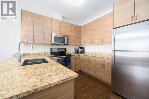 410-1200 Harrison Place, Kamloops, BC - Indoor Photo Showing Kitchen With Stainless Steel Kitchen With Double Sink With Upgraded Kitchen