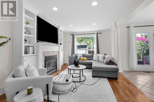 6628 Beattie Street, London, ON - Indoor Photo Showing Living Room With Fireplace