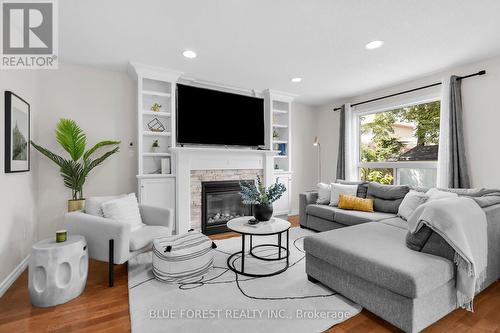 6628 Beattie Street, London, ON - Indoor Photo Showing Living Room With Fireplace