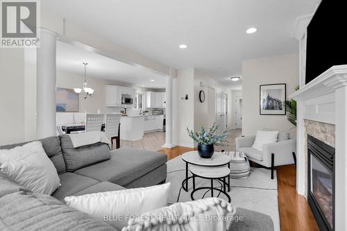 6628 Beattie Street, London, ON - Indoor Photo Showing Living Room With Fireplace