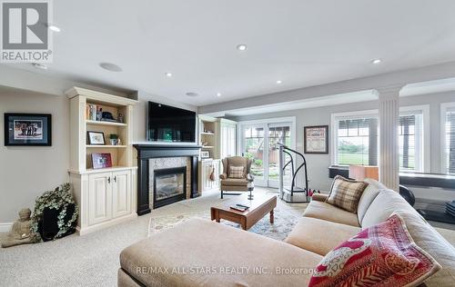 215 Southcrest Drive, Kawartha Lakes, ON - Indoor Photo Showing Living Room With Fireplace