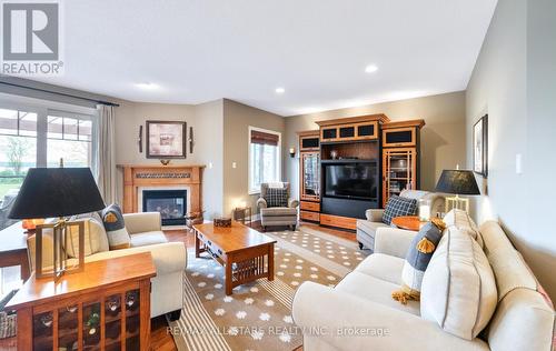 215 Southcrest Drive, Kawartha Lakes, ON - Indoor Photo Showing Living Room With Fireplace