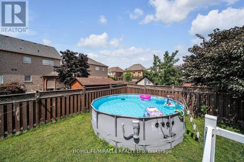 38 Eiffel Boulevard, Brampton (Vales Of Castlemore), ON - Outdoor With Above Ground Pool