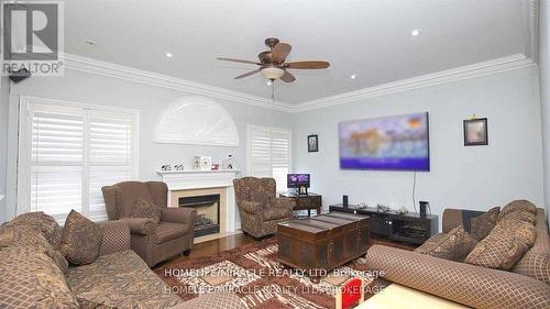 38 Eiffel Boulevard, Brampton, ON - Indoor Photo Showing Living Room With Fireplace