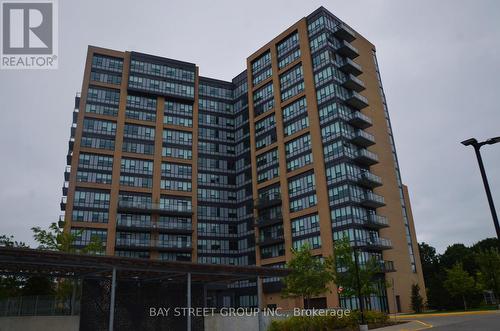 605 - 1028 Mcnicoll Avenue, Toronto (Steeles), ON - Outdoor With Balcony With Facade