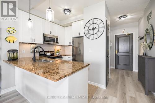 701 - 9235 Jane Street, Vaughan, ON - Indoor Photo Showing Kitchen With Double Sink With Upgraded Kitchen