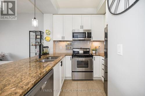 701 - 9235 Jane Street, Vaughan, ON - Indoor Photo Showing Kitchen With Double Sink