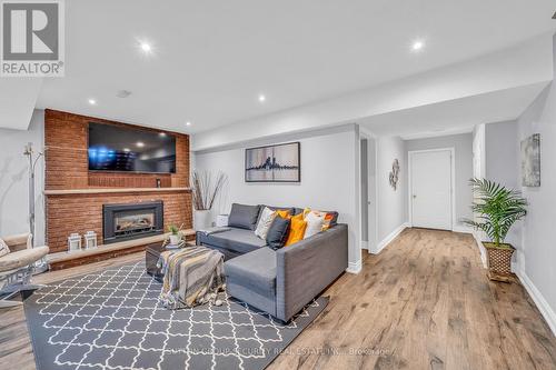 33 Hamer Boulevard, Toronto, ON - Indoor Photo Showing Living Room With Fireplace