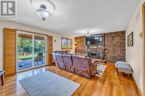 33 Hamer Boulevard, Toronto (Kingsview Village-The Westway), ON - Indoor Photo Showing Living Room With Fireplace