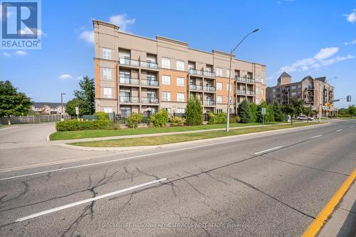 306 - 5317 Upper Middle Road, Burlington (Orchard), ON - Outdoor With Balcony With Facade