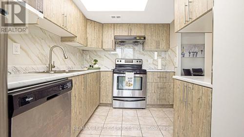 608 - 21 Markbrook Lane, Toronto (Mount Olive-Silverstone-Jamestown), ON - Indoor Photo Showing Kitchen