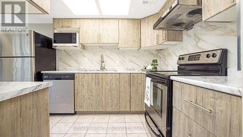 608 - 21 Markbrook Lane, Toronto (Mount Olive-Silverstone-Jamestown), ON - Indoor Photo Showing Kitchen