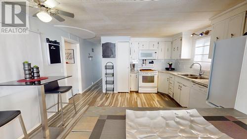 65 9207 82 Street, Fort St. John, BC - Indoor Photo Showing Kitchen With Double Sink