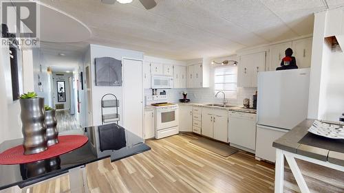 65 9207 82 Street, Fort St. John, BC - Indoor Photo Showing Kitchen With Double Sink