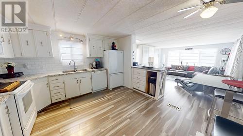 65 9207 82 Street, Fort St. John, BC - Indoor Photo Showing Kitchen With Double Sink