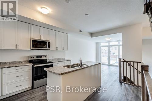 1 - 261 Skinner Road, Hamilton (Waterdown), ON - Indoor Photo Showing Kitchen With Double Sink