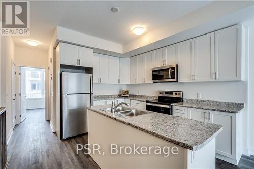 1 - 261 Skinner Road, Hamilton (Waterdown), ON - Indoor Photo Showing Kitchen With Double Sink