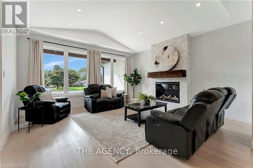 16 St Ladislaus Street, Norfolk, ON - Indoor Photo Showing Living Room With Fireplace