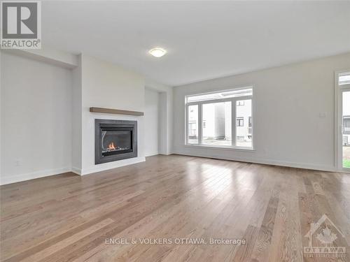 750 Cope Drive, Ottawa, ON - Indoor Photo Showing Living Room With Fireplace