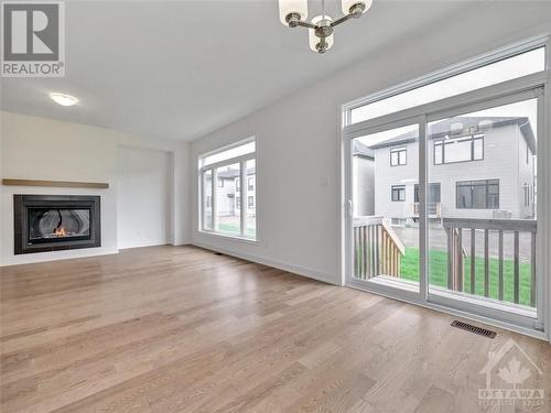 750 Cope Drive, Ottawa, ON - Indoor Photo Showing Living Room With Fireplace